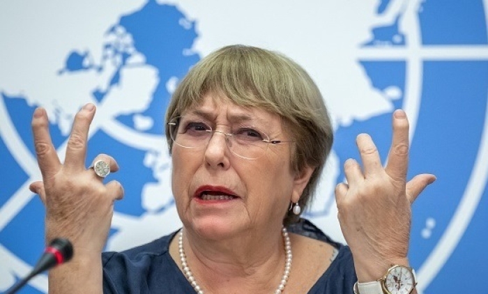 Outgoing U.N. High Commissioner for Human Rights Michelle Bachelet addresses a press conference in Geneva on Thursday. (Photo by Fabrice Coffrini/AFP via Getty Images)