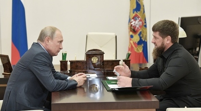 Head of the Chechen region Ramzan Kadyrov meets with Russian President Vladimir Putin nera Moscow in 2019.  (Photo by Alexey Nikolsky/Sputnik / AFP via Getty Images)