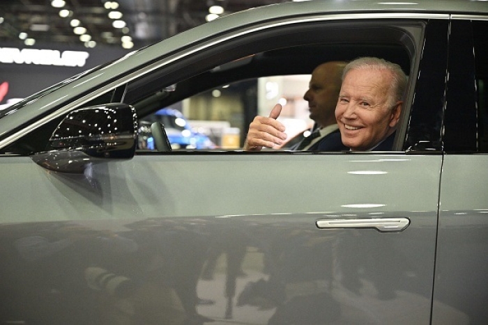 President Joe Biden sits at the wheel of a Cadillac Lyriq electric vehicle as he visits the 2022 North American International Auto Show in Detroit, Michigan, on September 14, 2022. (Photo by MANDEL NGAN/AFP via Getty Images)