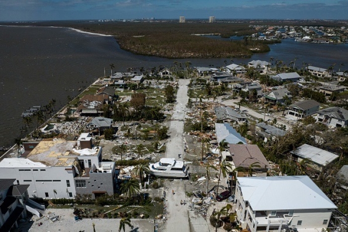 An aerial picture taken on September 29, 2022 shows the devastating aftermath of Hurricane Ian in Fort Myers, Florida. (Photo by RICARDO ARDUENGO/AFP via Getty Images)