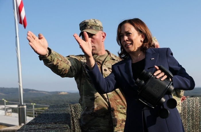 Vice President Kamala Harris gestures at a military observation post as she visits the demilitarized zone (DMZ) separating North and South Korea, in Panmunjom on September 29, 2022. (Photo by LEAH MILLIS/POOL/AFP via Getty Images)