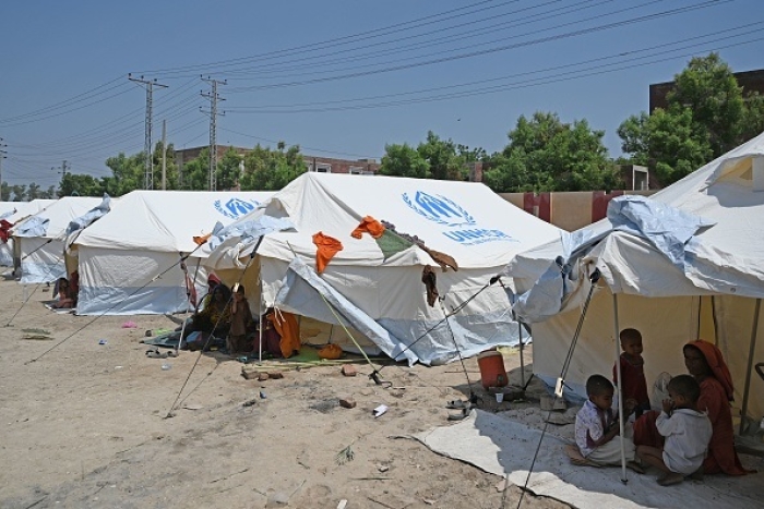 United Nations refugee tents at a makeshift camp in Sindh province, Pakistan on September 8, 2022. Record monsoon rains have caused devastating floods across Pakistan since June, killing more than 1,200 people and leaving almost a third of the country under water. (Photo by AAMIR QURESHI/AFP via Getty Images)