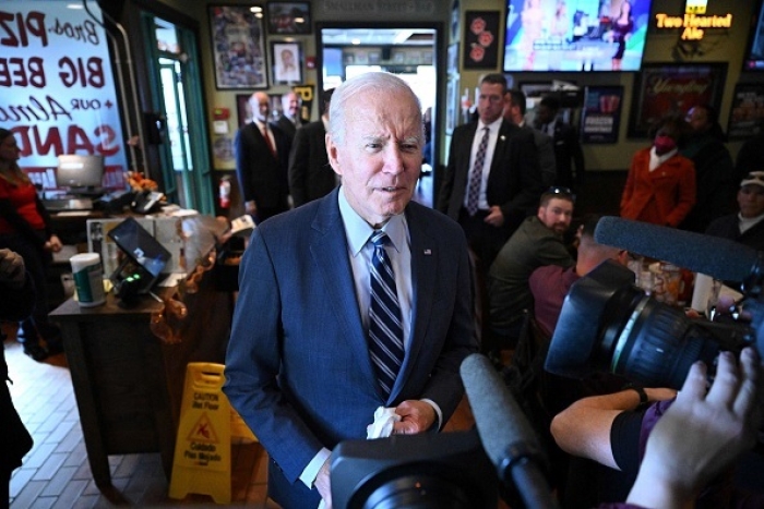 President Joe Biden speaks to the press during unannouced visit to Primanti Bros sandwich shop in Moon Township, Pennsylvania, on October 20, 2022.  (Photo by MANDEL NGAN/AFP via Getty Images)