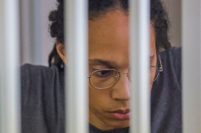 US Women's National Basketball Association (WNBA) basketball player Brittney Griner sits inside a defendants' cage after pleading guilty to drug charges in a Russian court on August 4, 2022. This week, a Russian judge rejected her plea for leniency. (Photo by EVGENIA NOVOZHENINA/POOL/AFP via Getty Images)