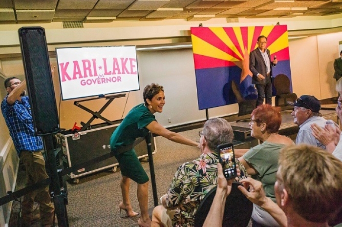 Republican candidate for Governor of Arizona Kari Lake greets supporters in Sun City, Arizona, on October 21, 2022. (Photo by OLIVIER TOURON/AFP via Getty Images)