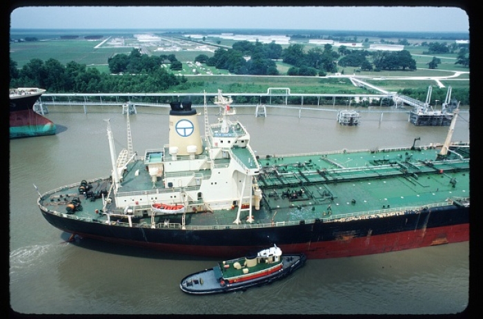 An oil tanker heads to the Bayou Chactaw Strategic Petroleum Reserve storage facility in Louisiana. Begun under President Ford to reduce the threat of oil embargoes, the SPR crude oil is stored in four huge underground salt caverns along the Gulf of Mexico. Photo by Robert Nickelsberg/Liaison)